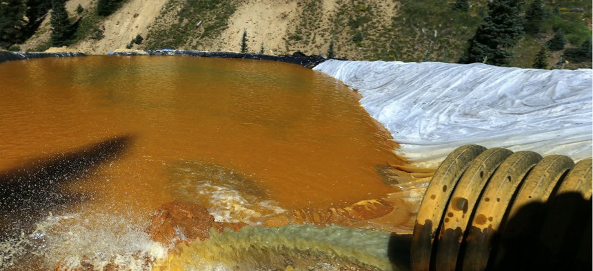 Water flows through a series of sediment retention ponds built to reduce heavy metal and chemical contaminants from the Gold King Mine wastewater accident.