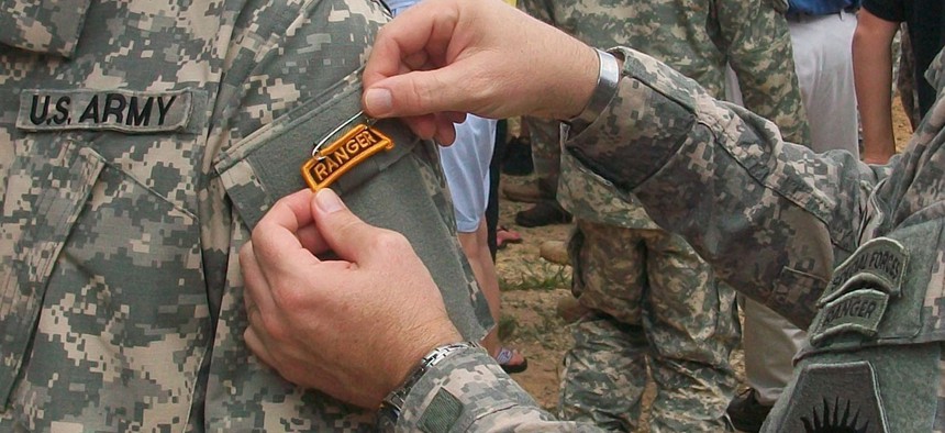 A member of Joint Task Force Domestic Support-Counterdrug, receives his Ranger tab after completing Ranger School in 2010.