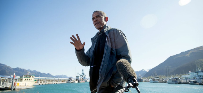 President Obama speaks to reporters before taking a boat tour at the Kenai Fjords National Park on Sept. 1 in Seward, Alaska. 