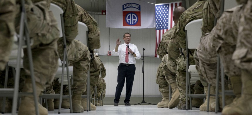 Defense Secretary Ash Carter talks to troops from the 82nd Airborne Division in Baghdad in July.
