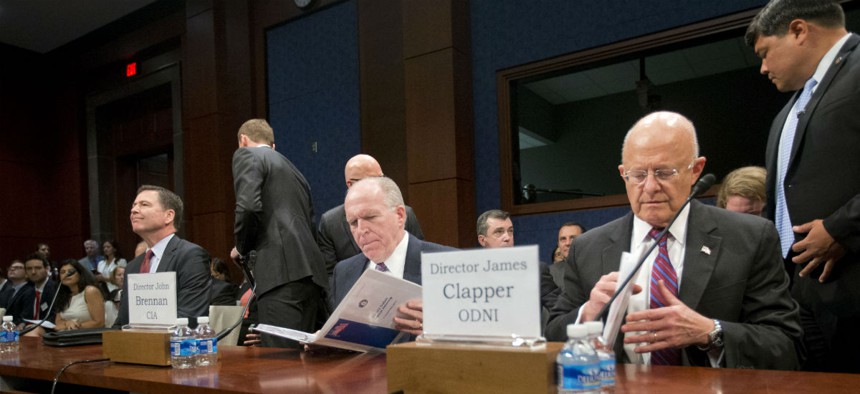 FBI Director James Comey, CIA Director John Brennan and Director of National Intelligence James Clapper prepare to testify on Capitol Hill Thursday. 