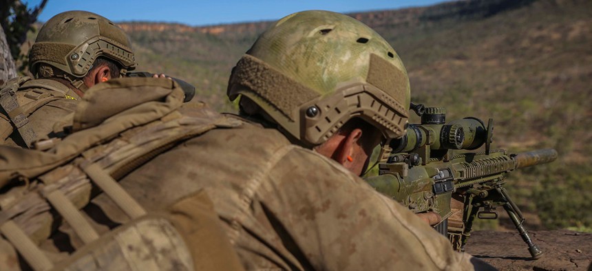 Marines participate in a training session in July. 