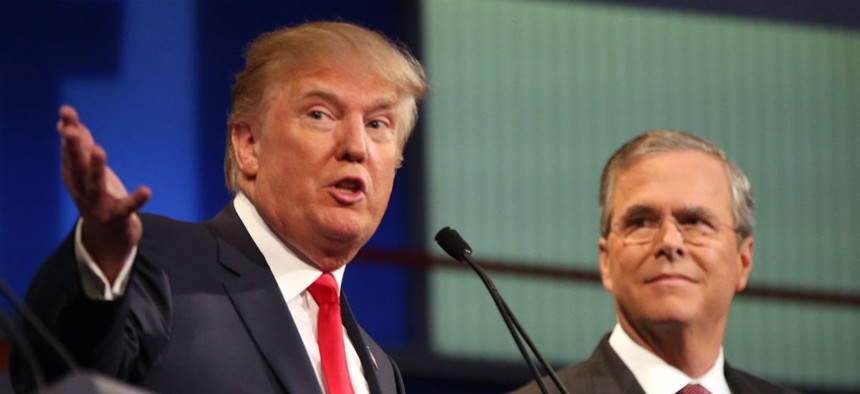 GOP presidential candidates Donald Trump (left) and Jeb Bush participate in the first Republican debate in August. 