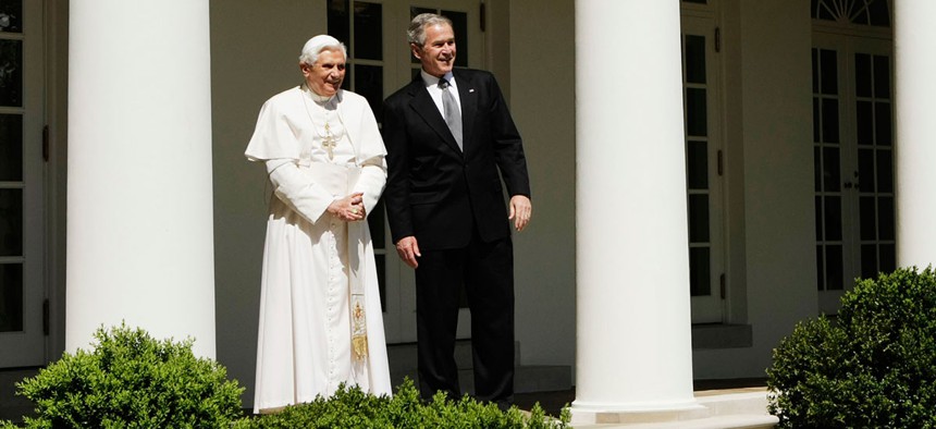 George W. Bush and Pope Benedict XVI stand outside the Oval Office in 2008.