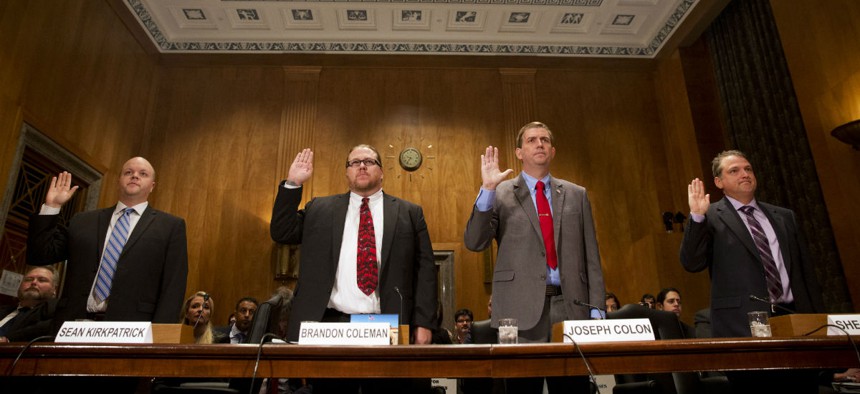 VA whistleblowers are sworn in before a hearing of the Senate Homeland Security and Governmental Affairs Committee. 