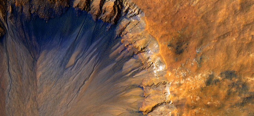 A crater in the Sirenum Fossae region of Mars.