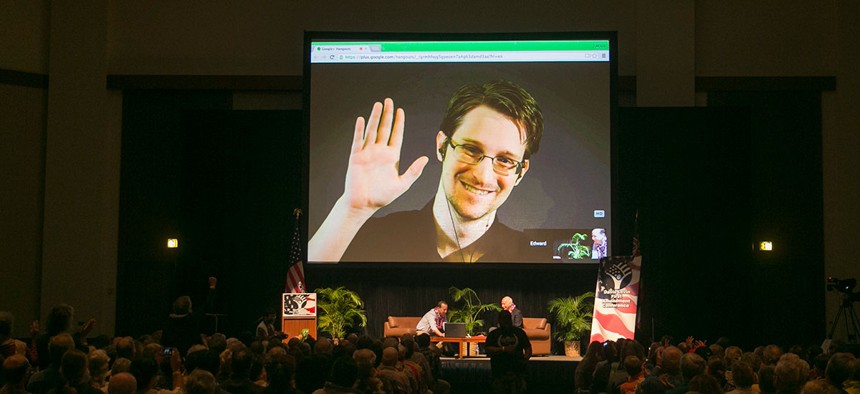 NSA leaker Edward Snowden appears on a live video feed broadcast from Moscow at an event in Hawaii in February.