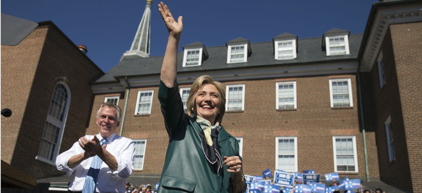 Democratic presidential candidate Hillary Clinton appears at a rally in Old Town Alexandria, Va., with Virginia Gov. Terry McAul­iffe.