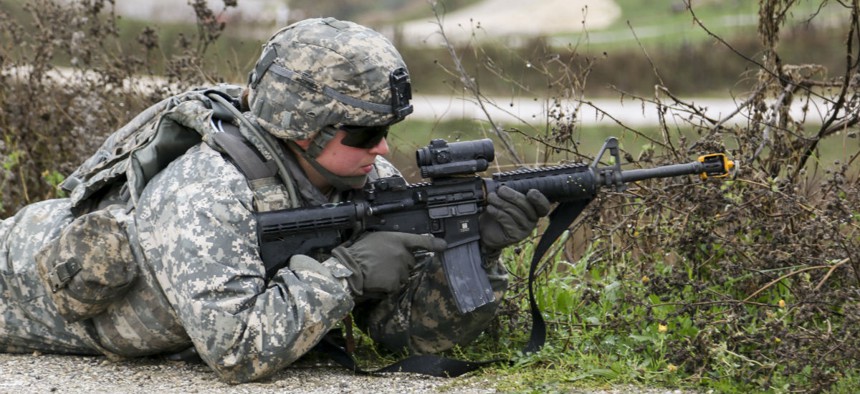 U.S. Army Spc. Felicia McCormick takes part in a training exercise in Kosovo.