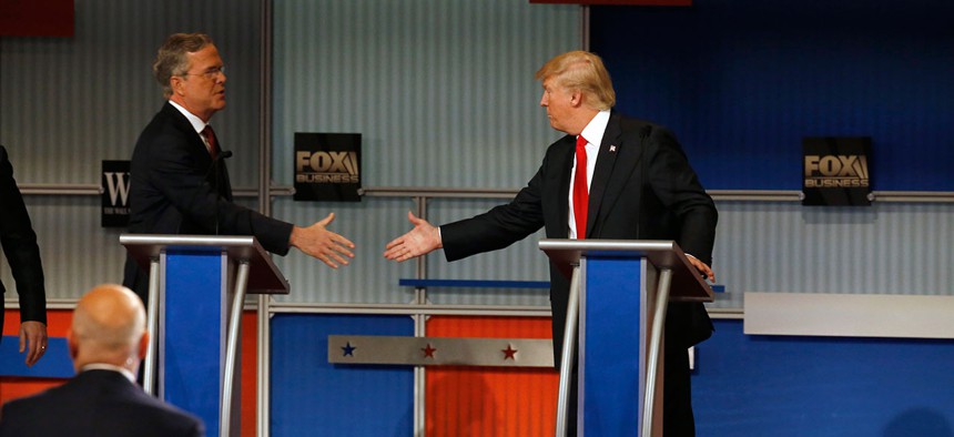 Jeb Bush and Donald Trump shake hands after the Republican presidential debate Tuesday.