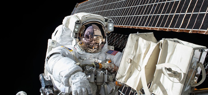 NASA astronaut Scott Kelly conducts a spacewalk in November.