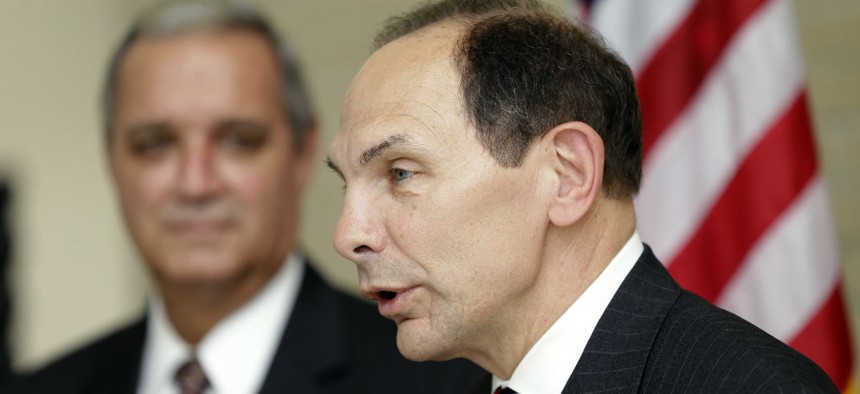 Secretary of Veterans Affairs Robert McDonald, right, speaks as Rep. Jeff Miller, R-Fla., Chairman of the House Committee on Veterans Affairs, looks on during a news conference in October.