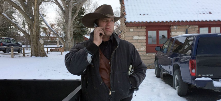 Ryan Bundy talks on the phone at the Malheur National Wildlife Refuge near Burns, Ore., on Sunday. 