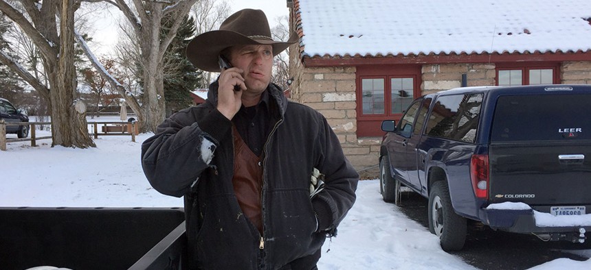 Ryan Bundy speaks on the phone Sunday at the Malheur facility, presumably asking someone for supplies.