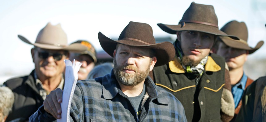 Ammon Bundy speaks with a reporter at a news conference at Malheur National Wildlife Refuge Friday.
