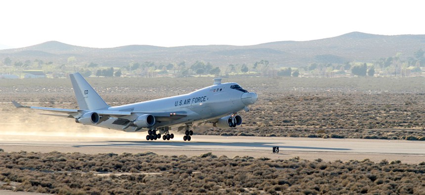 The YAL-1A Airborne Laser, a modified Boeing 747-400F, takes off from Edwards Air Force Base, California, on March 15 for a five-hour test mission.