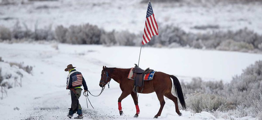 Cowboy Dwane Ehmer walks his horse at the Malheur National Wildlife Refuge during the occupation.