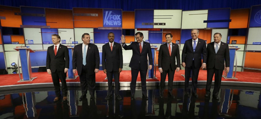 Presidential candidates Rand Paul, Chris Christie, Ben Carson, Ted Cruz, Marco Rubio, Jeb Bush and John Kasich appear before a Republican presidential primary debate, Thursday.