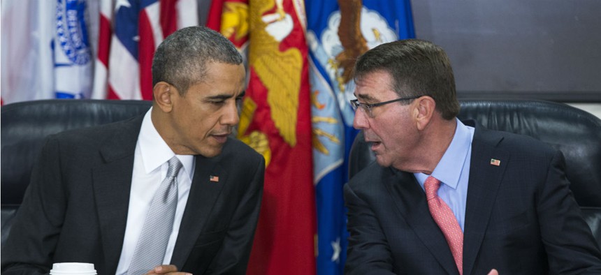President Barack Obama talks with Defense Secretary Ash Carter during a meeting with the National Security Council in December at the Pentagon.