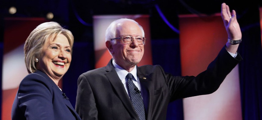 Democratic presidential candidates Hillary Clinton and Bernie Sanders pose for a photo before their debate Thursday. 