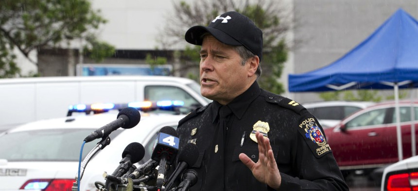 Montgomery County Police Capt. Paul Starks speaks to the media outside the Westfield Montgomery Mall in Bethesda, Md., Friday after a shooting.