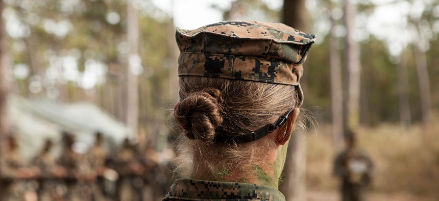  U.S. Marine Corps Private First Class Katie M. Gorz receives instruction during a training exercise in 2013.