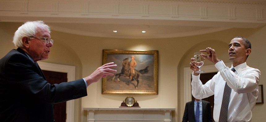 Obama and Sanders joke at a meeting at the White House in 2010.