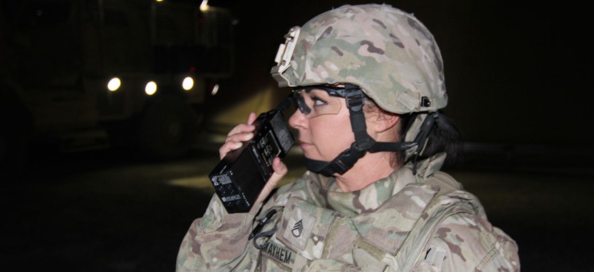 Staff Sgt. Shelda  Mairel directs communication in Kandahar in 2014.