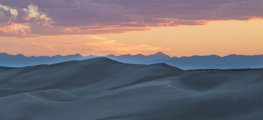 The St. Anthony Sand Dunes appears as a rolling sea of sand on the eastern edge of Idaho’s volcanic Snake River Plain. 