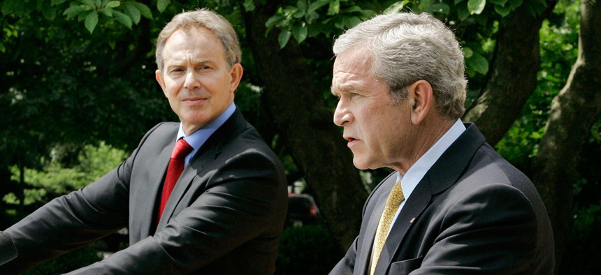Bush and Blair speak at a joint press conference in 2007