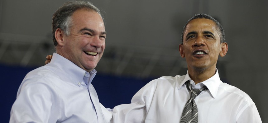 Tim Kaine (left) joins President Obama at a campaign event in 2012. 