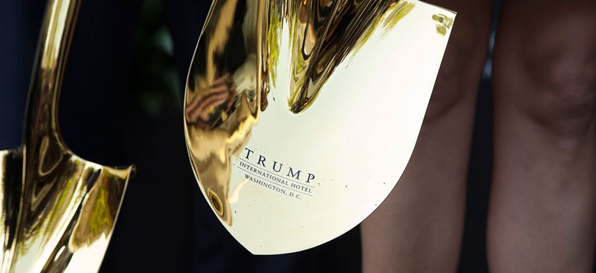 A shovel with the Tump logo is sheen during a ground breaking ceremony for the Trump International Hotel on the site of the Old Post Office in 2014.