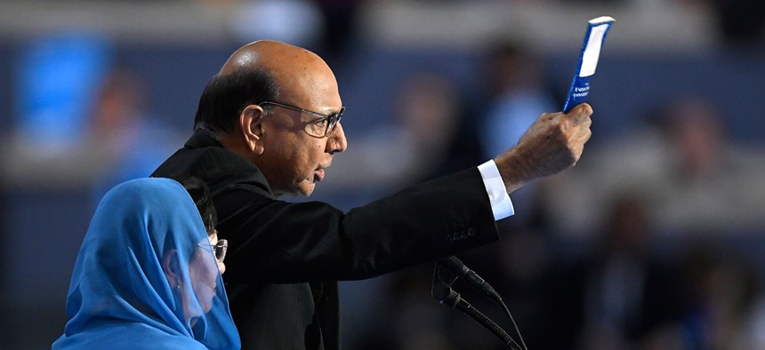 Khizr Khan, father of fallen US Army Capt. Humayun S. M. Khan, holds up his copy the United State Constitution at the Democratic National Convention.