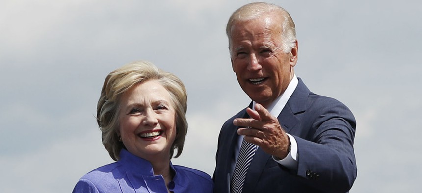 Clinton and Biden arrive at the Wilkes-Barre/Scranton International Airport on Monday. 
