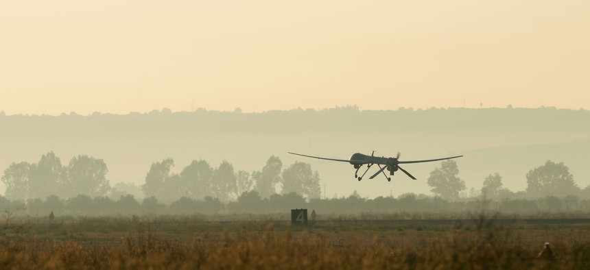 An MQ-1 Predator unmanned aerial vehicle attached to the 324th Expeditionary Reconnaissance Squadron takes off in 2013.