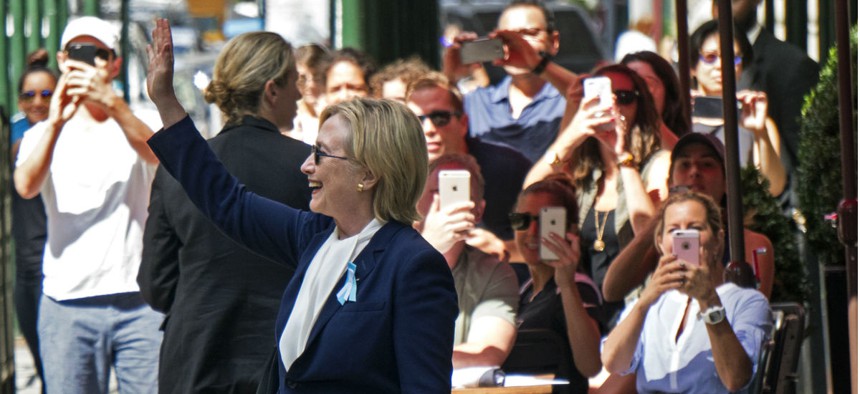 Democratic presidential candidate Hillary Clinton leaves her daughter's apartment in New York, after going there to recover from overheating at a Sept. 11 memorial ceremony. 