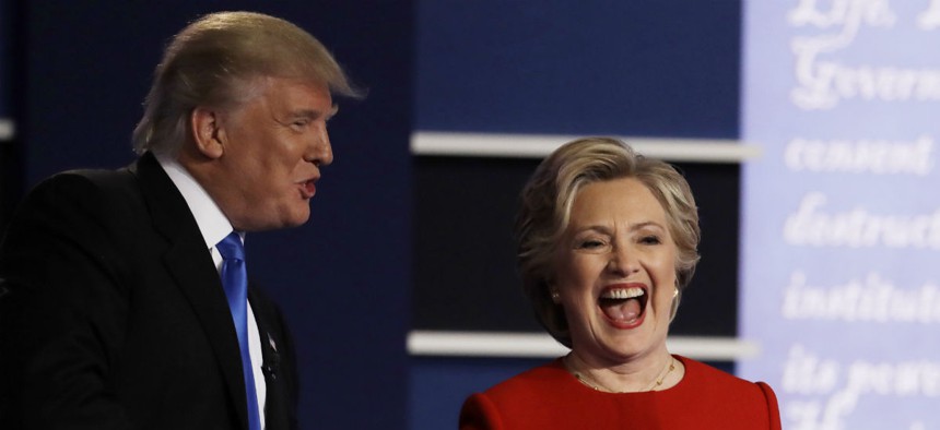 Republican presidential nominee Donald Trump and Democratic nominee Hillary Clinton shake hands after their first debate. 