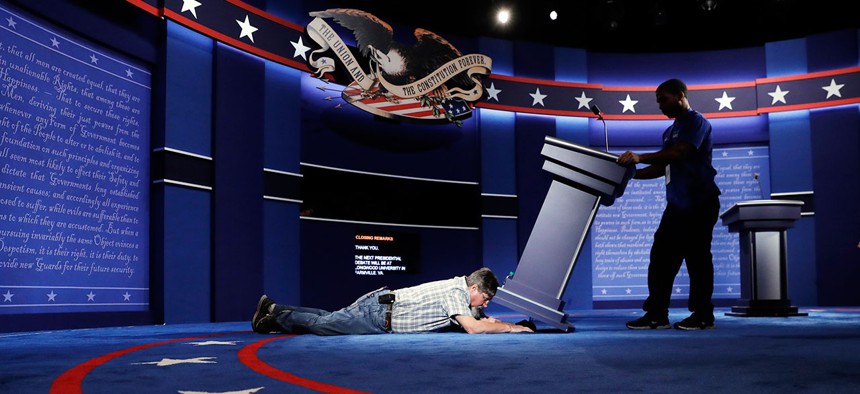 On Sunday, technicians set up the stage for the presidential debate.