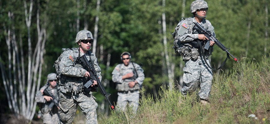 Soldiers conduct patrols during a Situational Training Exercise (STX) as part of the Basic Leaders Training Course in Vermont in August.
