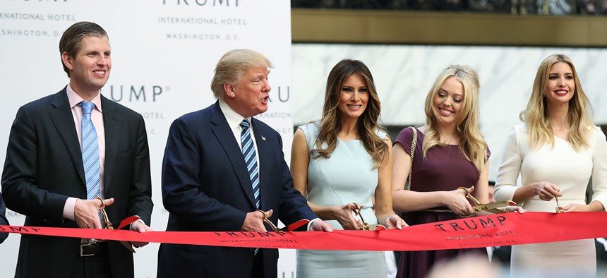 Trump and his family cut the ribbon during the grand opening of Trump International Hotel in Washington in October.