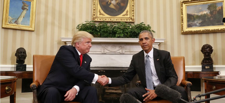 President Barack Obama and President-elect Donald Trump shake hands following their meeting in the Oval Office of the White House in Washington on Nov. 10.
