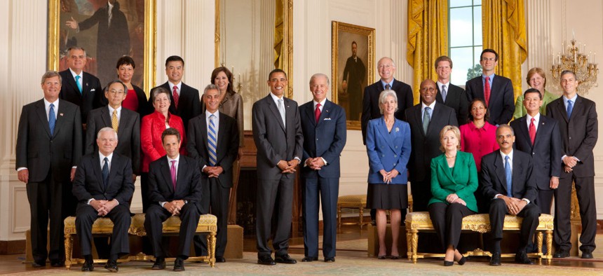 President Obama poses with his cabinet in 2009. He sought to create a more diverse federal workforce, starting at the top.
