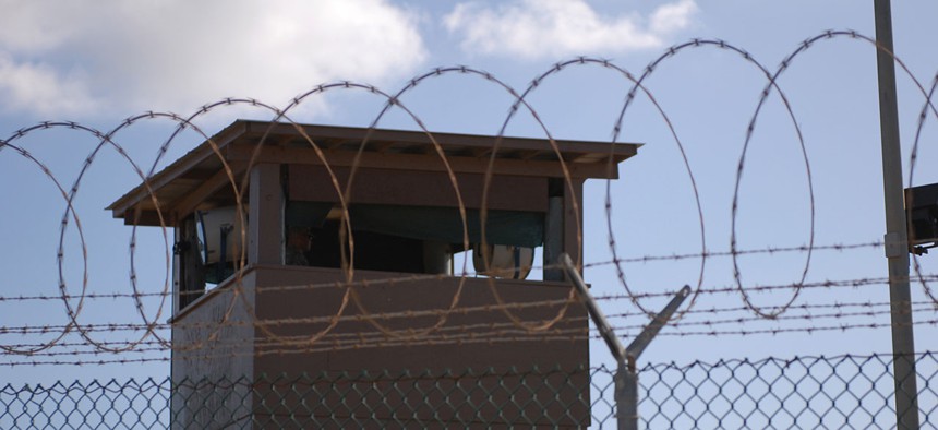  A soldier stands guard in a tower at Camp Delta at Joint Task Force Guantanamo Bay in 2009.