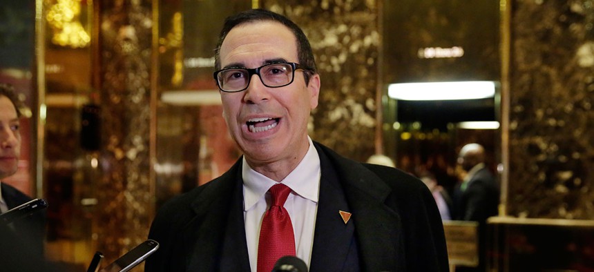 Steven Mnuchin speaks to reporters after meeting with the president-elect at Trump Tower on Wednesday.
