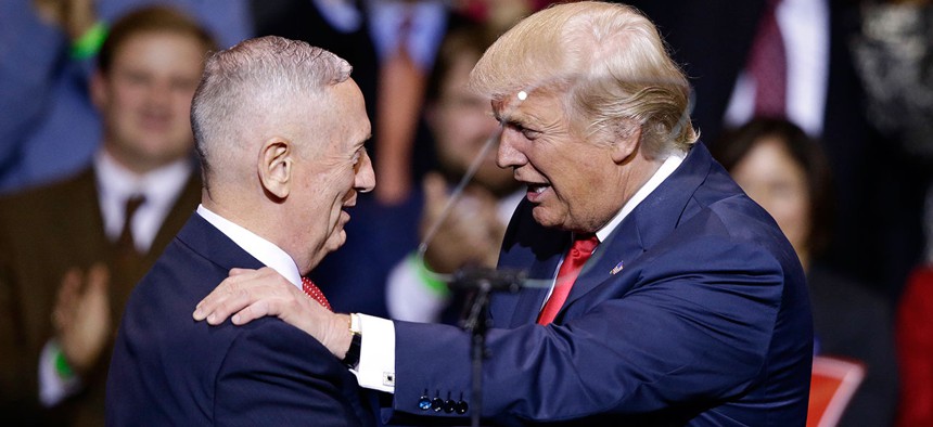 Donald Trump introduces retired Marine Corps Gen. James Mattis on Tuesday in Fayetteville, North Carolina.