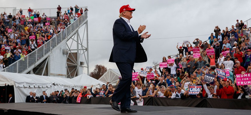 Donald Trump arrives to speak at a rally at Ladd-Peebles Stadium on Saturday in Mobile, Ala.
