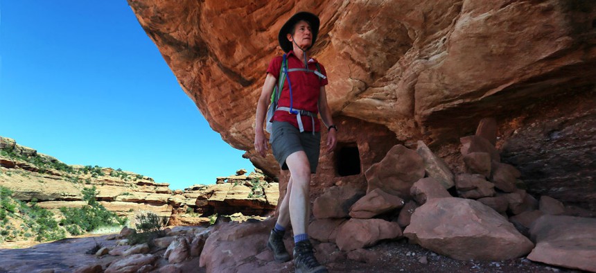Interior Secretary Sally Jewell, visits ancient cliff dwellings in McCloyd Canyon in Southern Utah in July.
