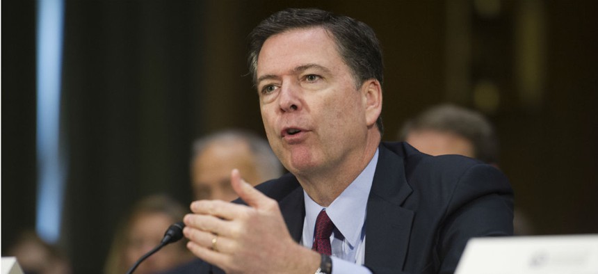 FBI Director James Comey has been criticized for potential bias in making public statements on the ongoing investigation into Democratic candidate Hillary Clinton at a sensitive time during election season. 