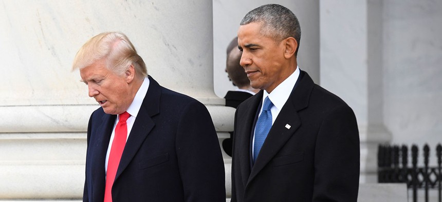 Donald Trump and Barack Obama walk together after the inauguration.