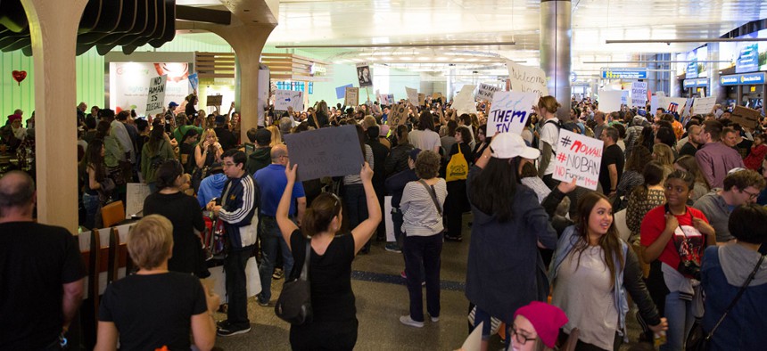 Protesters demonstrate at Los Angeles International Airport Sunday.